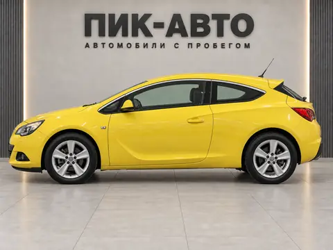 Opel Astra GTC 2012, вид сбоку